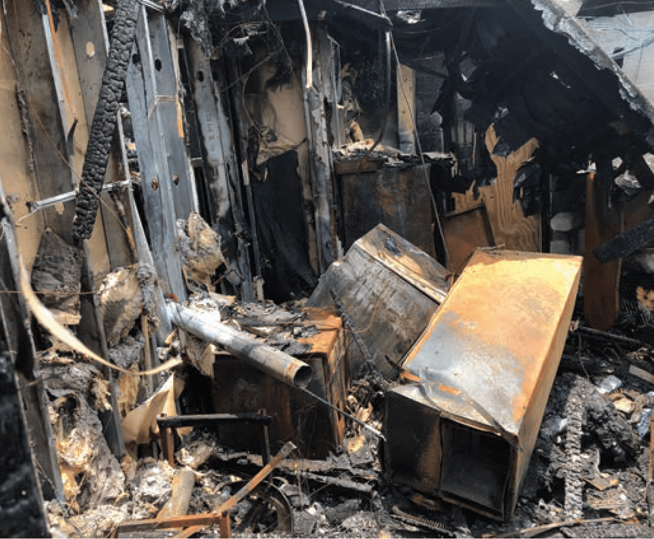 Burnt Kitchen Appliances Fallen Into The Ashes