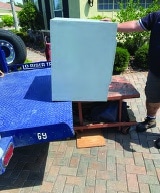 The Safe Is Moving From The Trailer To The Elevation Table